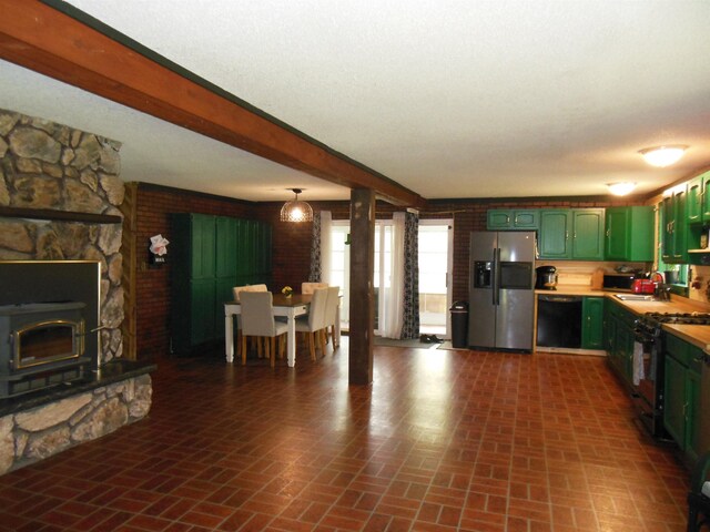 5871 Edith Schneider Rd, Harrison, MI 48625 - kitchen with green cabinetry, black appliances, brick patterned floors, a sink, and light countertops