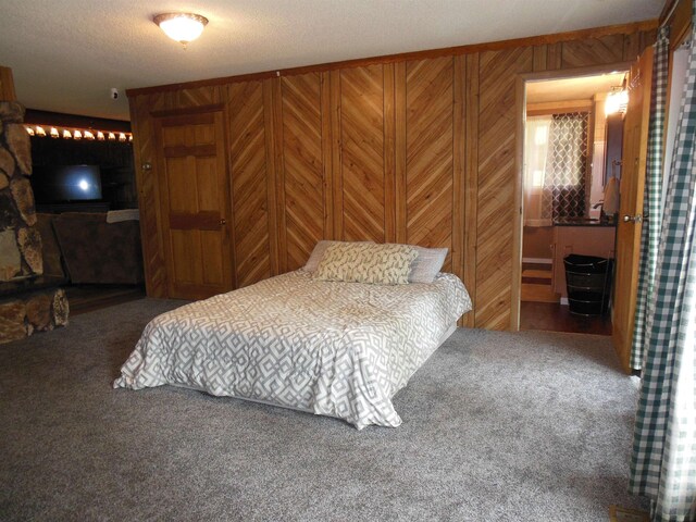 5871 Edith Schneider Rd, Harrison, MI 48625 - bedroom with carpet flooring and wood walls