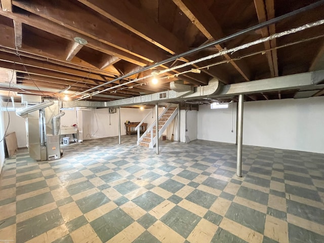 19993 Woodmont St, Harper Woods, MI 48225 - finished basement with tile patterned floors, heating unit, stairway, and a sink
