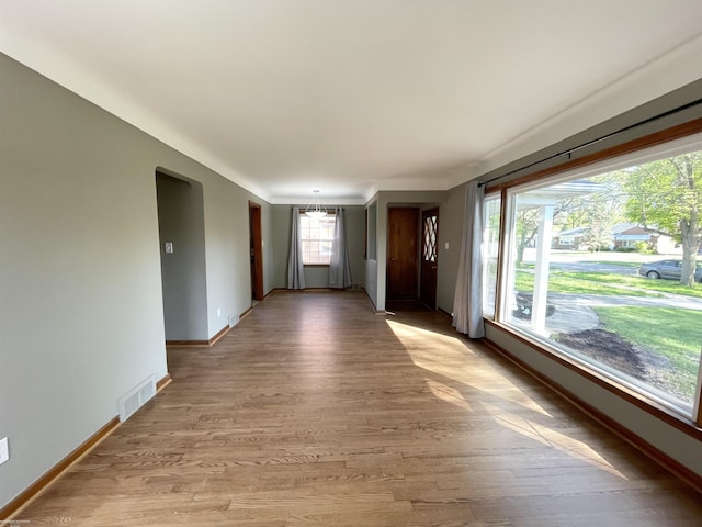 19993 Woodmont St, Harper Woods, MI 48225 - empty room featuring light wood-style floors and baseboards