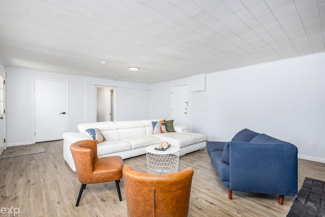 3168 Herbell Dr, Waterford, MI 48328 - living area featuring light wood-style flooring and baseboards