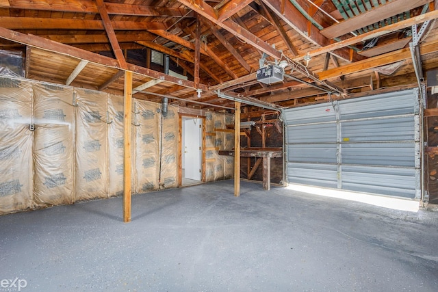 3168 Herbell Dr, Waterford, MI 48328 - garage featuring a garage door opener