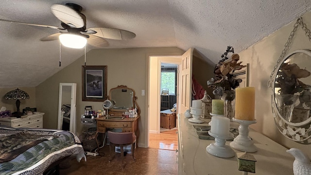 7741 White Birch St, Farwell, MI 48622 - bedroom with vaulted ceiling, a textured ceiling, and ceiling fan