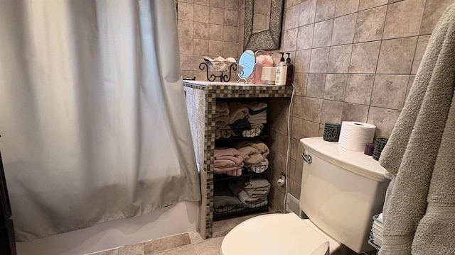 7741 White Birch St, Farwell, MI 48622 - bathroom with shower / bath combo, toilet, and tile walls