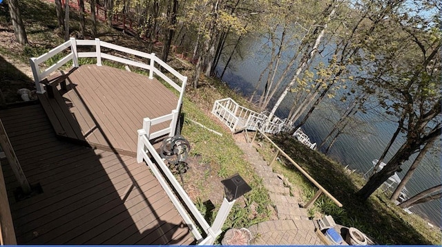 7741 White Birch St, Farwell, MI 48622 - wooden terrace with a water view