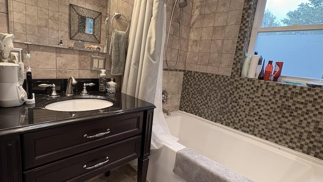 7741 White Birch St, Farwell, MI 48622 - full bathroom with shower / bath combo, vanity, and tasteful backsplash