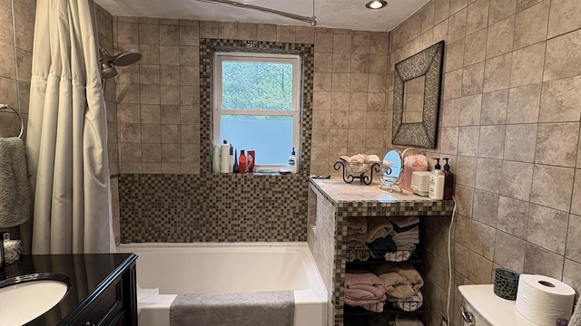 7741 White Birch St, Farwell, MI 48622 - full bath featuring a tub, vanity, tile walls, and a shower with shower curtain