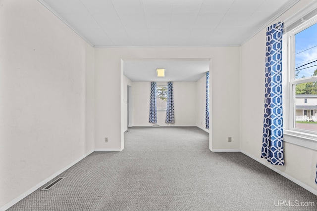 336 Fulton St, Mohawk, MI 49950 - carpeted spare room with healthy amount of natural light, baseboards, and crown molding
