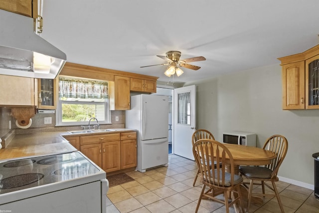 3710 N River Rd, Fort Gratiot, MI 48059 - kitchen featuring a sink, white appliances, a ceiling fan, tasteful backsplash, and glass insert cabinets