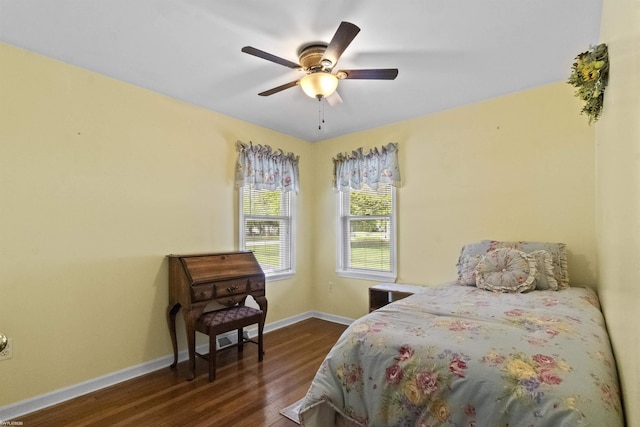 3710 N River Rd, Fort Gratiot, MI 48059 - bedroom with dark wood finished floors, baseboards, and ceiling fan