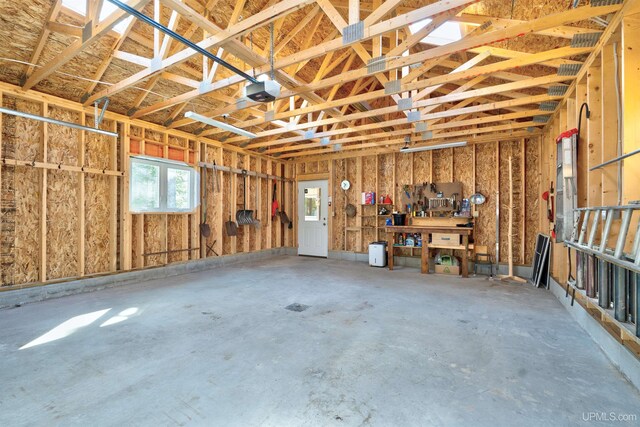 3159 N State Highway M94, Manistique, MI 49854 - garage featuring a garage door opener