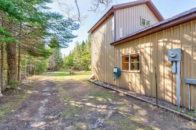 3159 N State Highway M94, Manistique, MI 49854 - view of side of property with board and batten siding