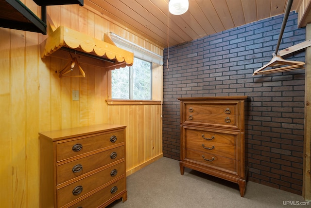 3159 N State Highway M94, Manistique, MI 49854 - bedroom with light carpet and wood walls