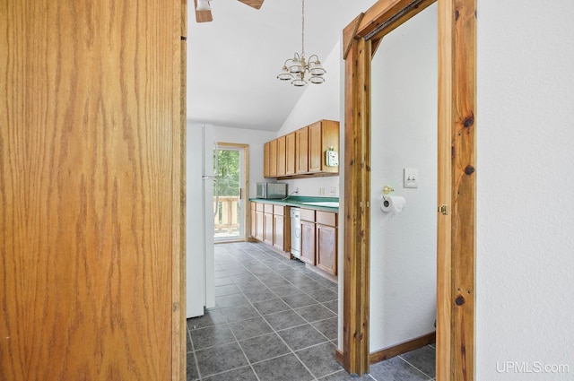 8413 Gay Park Rd, Lake Linden, MI 49945 - corridor with lofted ceiling, dark tile patterned floors, and a chandelier
