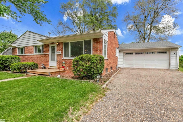 3582 David K Dr, Waterford, MI 48329 - view of front facade featuring brick siding, a front yard, and a garage