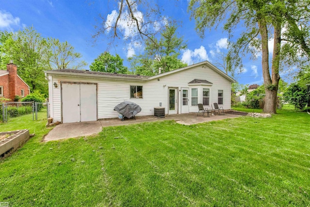 3582 David K Dr, Waterford, MI 48329 - back of property featuring central AC unit and a patio