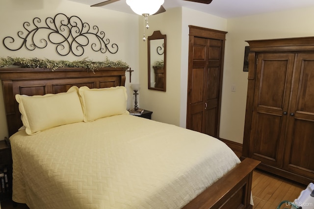 120 E Prospect St, Marquette, MI 49855 - bedroom featuring wood finished floors and a ceiling fan