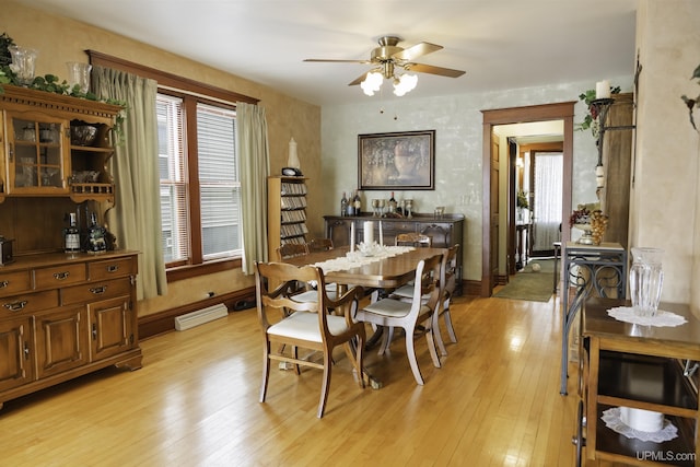 120 E Prospect St, Marquette, MI 49855 - dining room featuring ceiling fan, light wood-type flooring, and baseboards