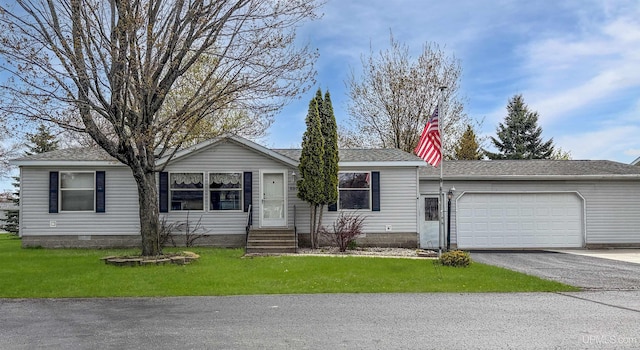 20 Kenneally Blvd St, Gladstone, MI 49837 - single story home featuring an attached garage, asphalt driveway, crawl space, entry steps, and a front lawn