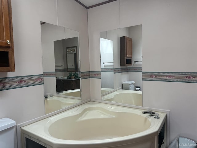20 Kenneally Blvd St, Gladstone, MI 49837 - bathroom featuring toilet and vanity