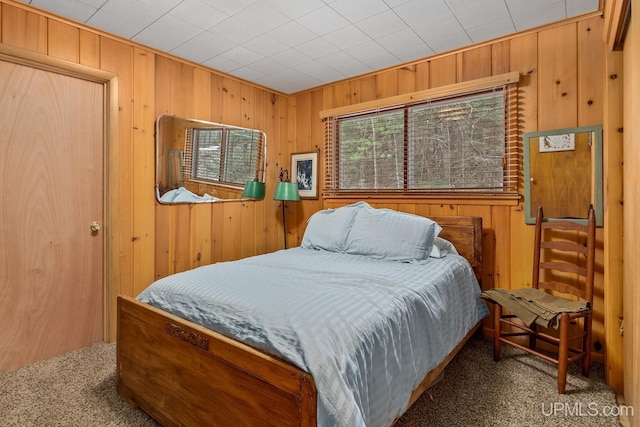 3172 Harry Patterson Dr, Phelps, WI 54554 - bedroom featuring carpet floors and wood walls