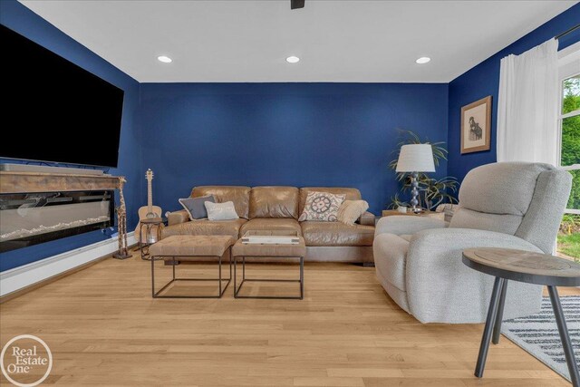 28800 Old N River Rd, Harrison Twp, MI 48045 - living area with wood finished floors, recessed lighting, and baseboards