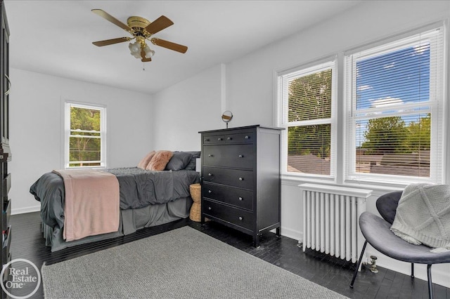 28800 Old N River Rd, Harrison Twp, MI 48045 - bedroom with radiator, baseboards, and a ceiling fan