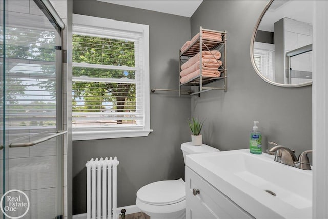 28800 Old N River Rd, Harrison Twp, MI 48045 - bathroom featuring radiator, vanity, toilet, and baseboards