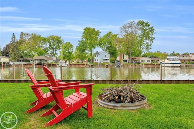 28800 Old N River Rd, Harrison Twp, MI 48045 - dock featuring a residential view, an outdoor fire pit, a lawn, and a water view