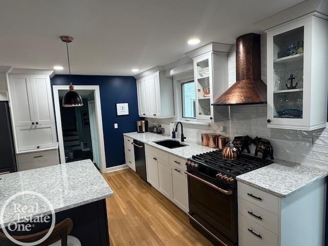 28800 Old N River Rd, Harrison Twp, MI 48045 - kitchen featuring wall chimney exhaust hood, black appliances, a sink, white cabinets, and recessed lighting