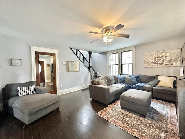1217 S Kimberly Ave, Iron Mountain, MI 49801 - living room with a ceiling fan, dark wood-style floors, stairway, and baseboards