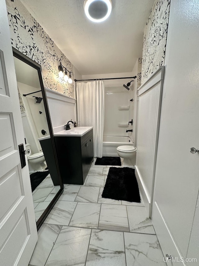 1217 S Kimberly Ave, Iron Mountain, MI 49801 - full bath with toilet, shower / tub combo with curtain, vanity, and marble finish floors