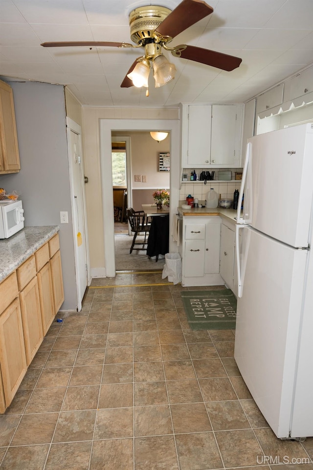 3110 County Road Fd Rd, Champion, MI 49814 - kitchen featuring white appliances, a ceiling fan, light countertops, and light brown cabinets
