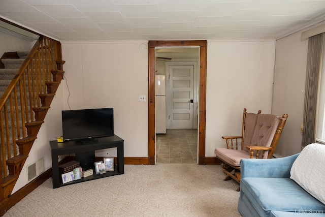 3110 County Road Fd Rd, Champion, MI 49814 - carpeted living area featuring stairs and baseboards