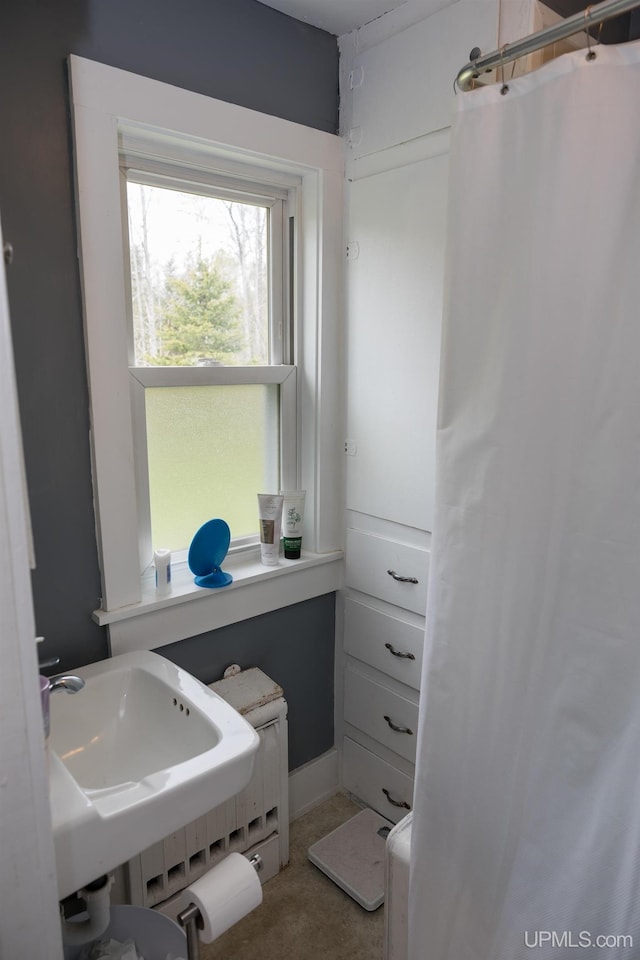 3110 County Road Fd Rd, Champion, MI 49814 - full bath with curtained shower and a sink