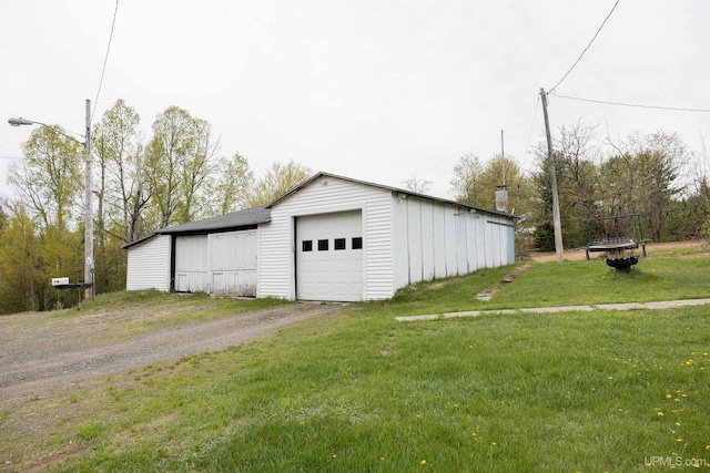 3110 County Road Fd Rd, Champion, MI 49814 - detached garage featuring driveway