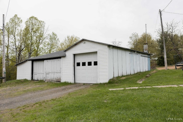 3110 County Road Fd Rd, Champion, MI 49814 - detached garage featuring driveway