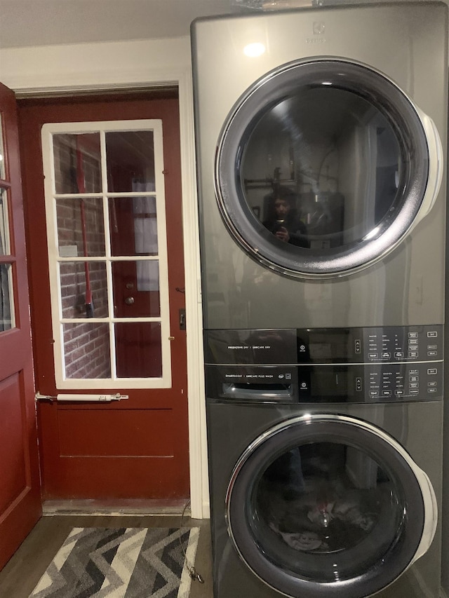 103 E Washington St, Coleman, MI 48618 - washroom with stacked washer / drying machine