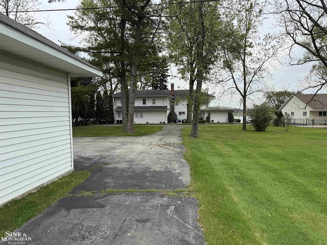2740 River Rd, Marysville, MI 48040 - view of grassy yard with driveway