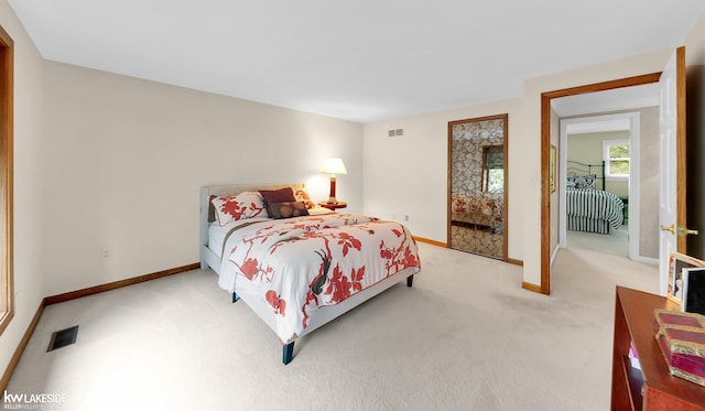 46713 Houghton Dr, Shelby Twp, MI 48315 - bedroom with light carpet and baseboards