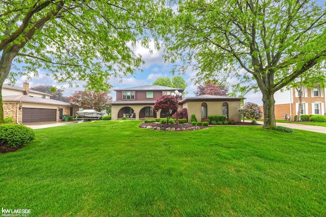 46713 Houghton Dr, Shelby Twp, MI 48315 - view of front of home featuring a front yard and driveway