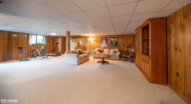 46713 Houghton Dr, Shelby Twp, MI 48315 - living room featuring wooden walls, carpet, and a drop ceiling