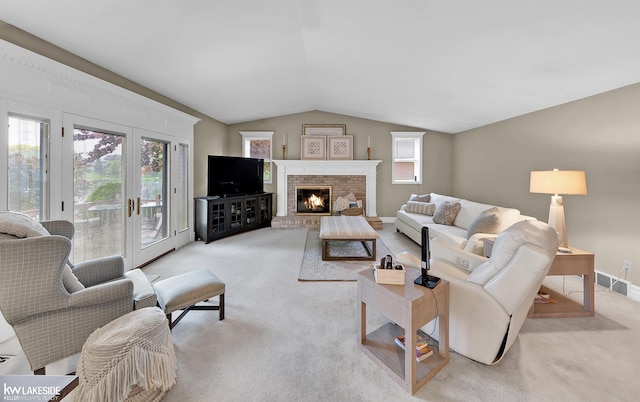 46713 Houghton Dr, Shelby Twp, MI 48315 - living area with light carpet, lofted ceiling, baseboards, and a brick fireplace