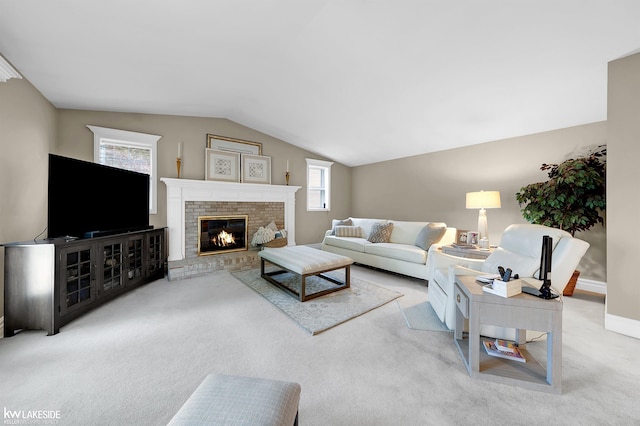 46713 Houghton Dr, Shelby Twp, MI 48315 - living area featuring lofted ceiling, carpet floors, baseboards, and a brick fireplace