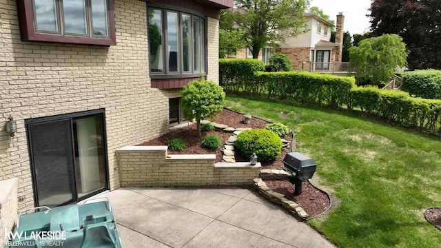 46713 Houghton Dr, Shelby Twp, MI 48315 - view of grassy yard with a patio area