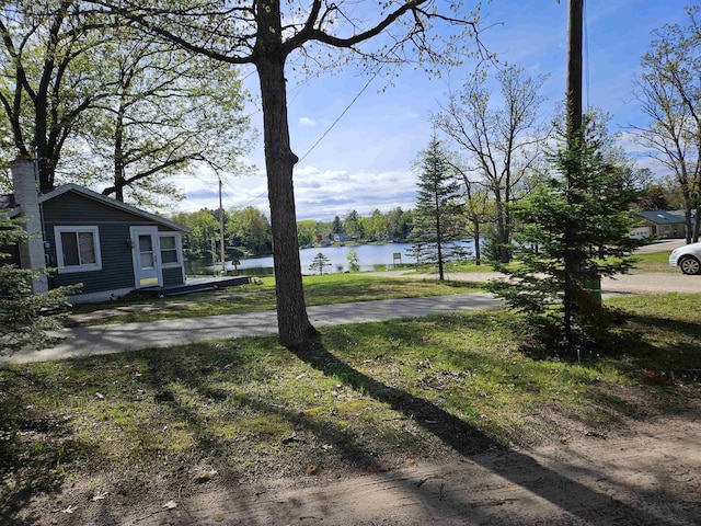 6918 Rumsey Rd, Harrison, MI 48625 - view of yard featuring a water view