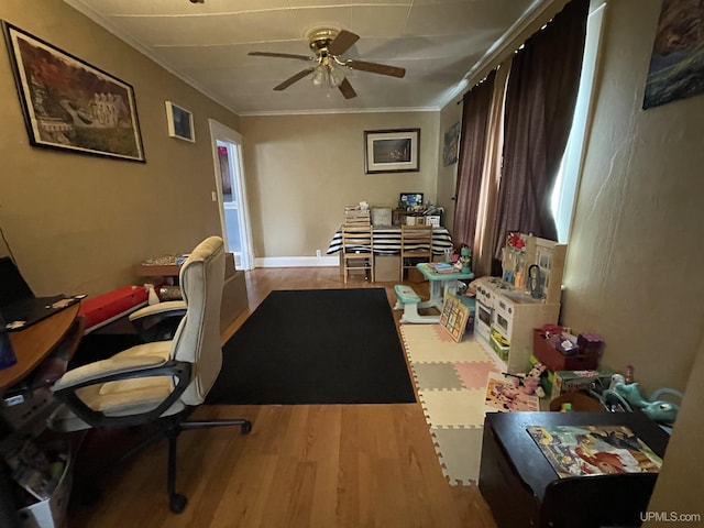 1110 N 2nd St, Ishpeming, MI 49849 - office space featuring a ceiling fan, wood finished floors, and crown molding