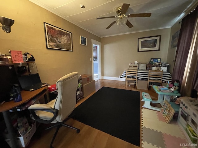 1110 N 2nd St, Ishpeming, MI 49849 - office area featuring ceiling fan, wood finished floors, and ornamental molding
