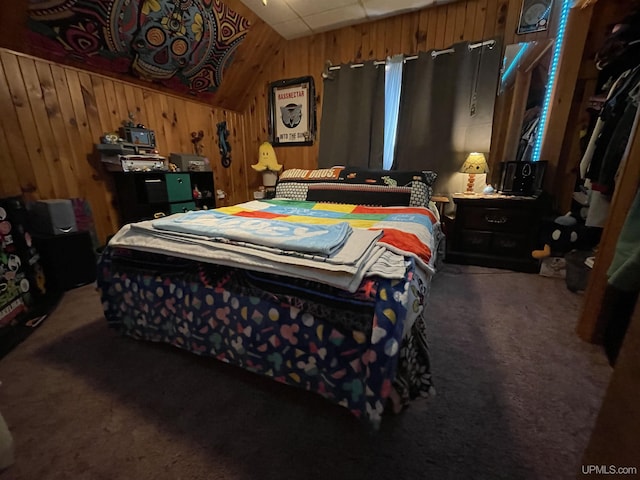 1110 N 2nd St, Ishpeming, MI 49849 - bedroom featuring carpet floors and wooden walls