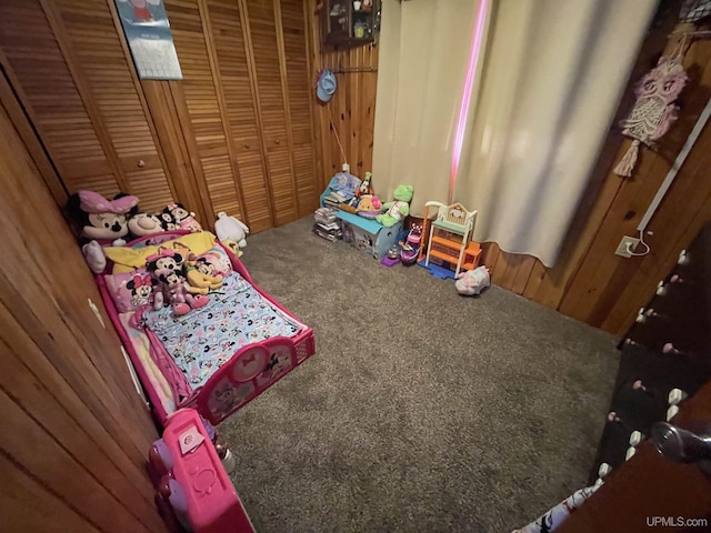 1110 N 2nd St, Ishpeming, MI 49849 - carpeted bedroom featuring wooden walls